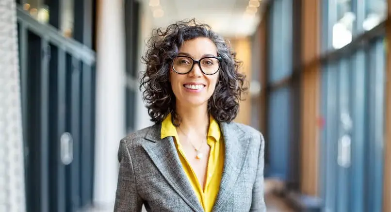 A business woman in a business suit.