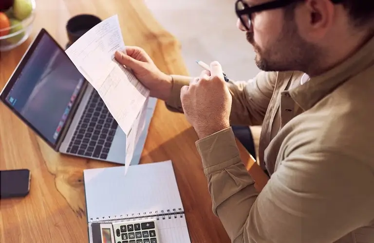 A man going over his tax documents